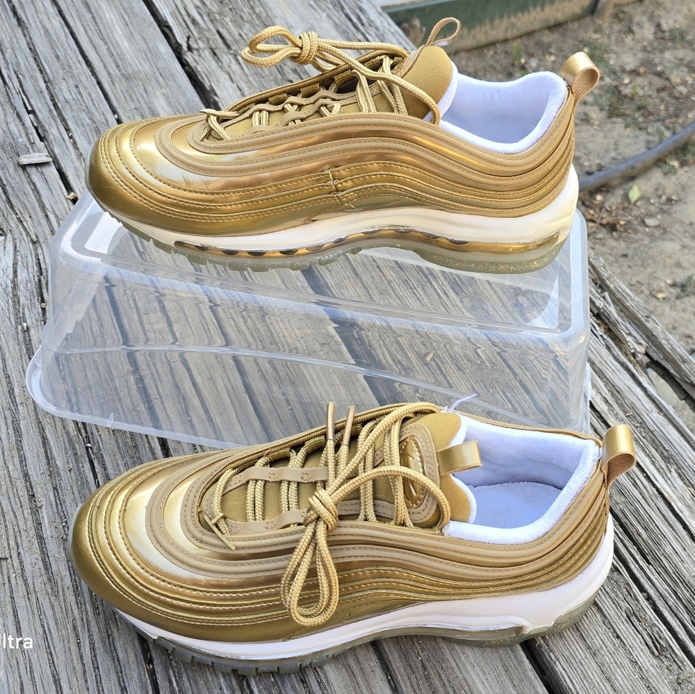 Nike Air Max 97 gold women's size 7.5. Gently worn.